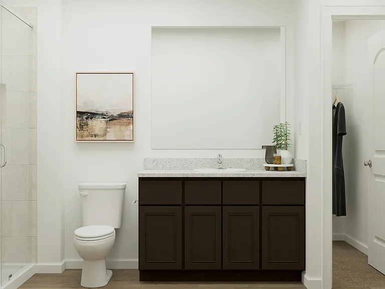The master bathroom features a step-in shower.