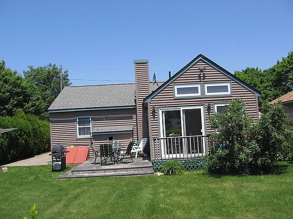 Private backyard with deck. 