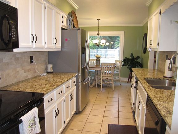Tile floors, painted cabinet