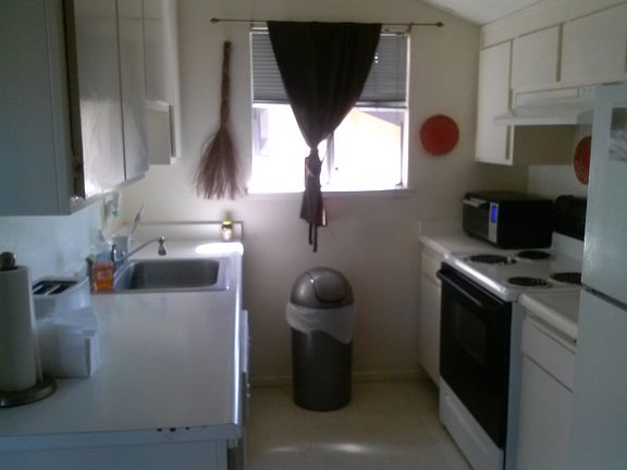 Clean kitchen with plenty of cookware for your use