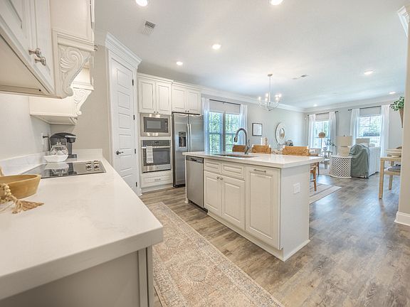 Kitchen in the Decatur floorplan at a Meritage Homes community in Gulfport, MS.