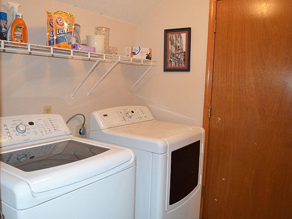 Laundry room with washer and dryer included