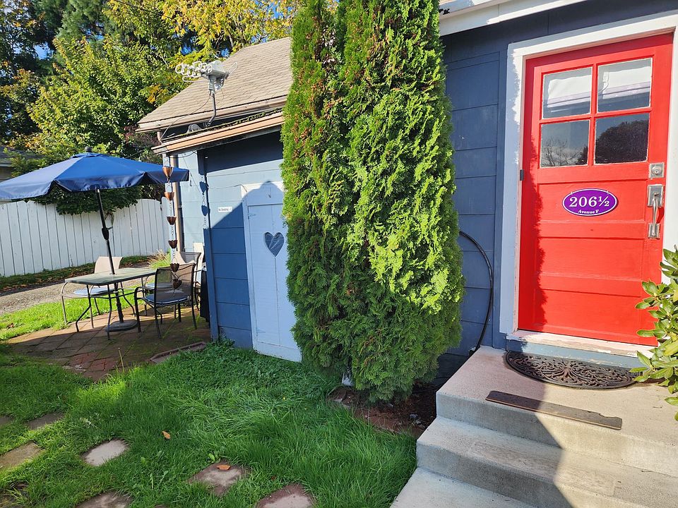 Front door showing the patio and alley access