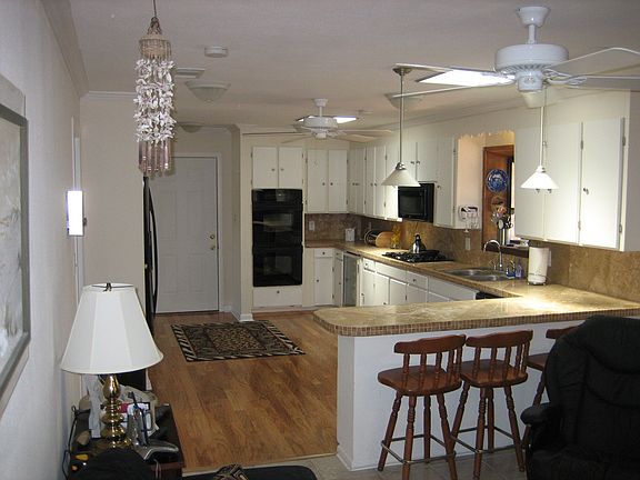Beautiful Updated kitchen with new custom travertine countertops & appliances