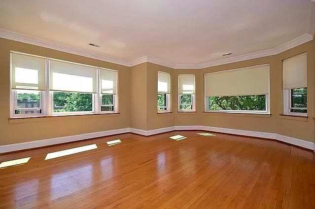 Living room. Lots of windows, light, and space.
