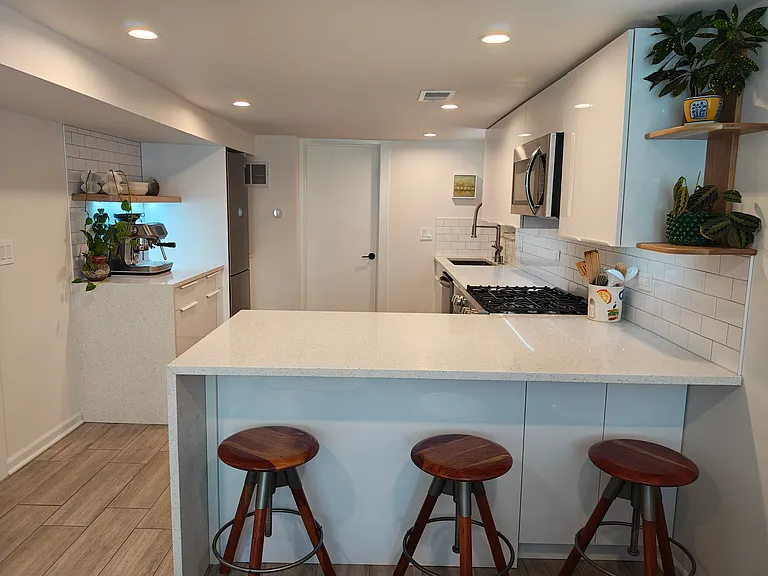Kitchen area with lots of storage.