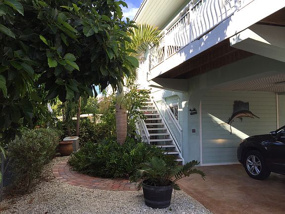 Garden entrance to back deck, stairs to deck