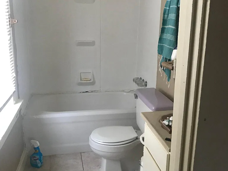 bath with tub/shower combo