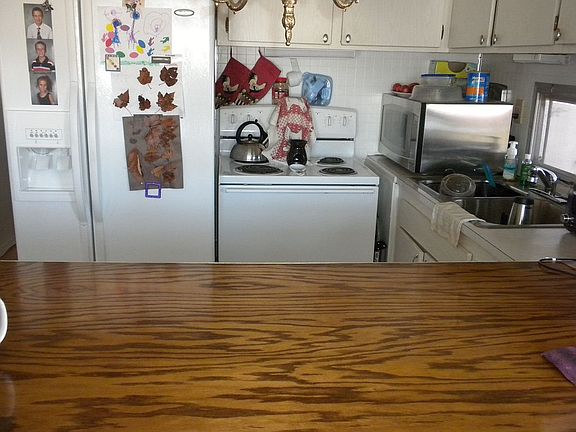 Side by side refrigerator & stove