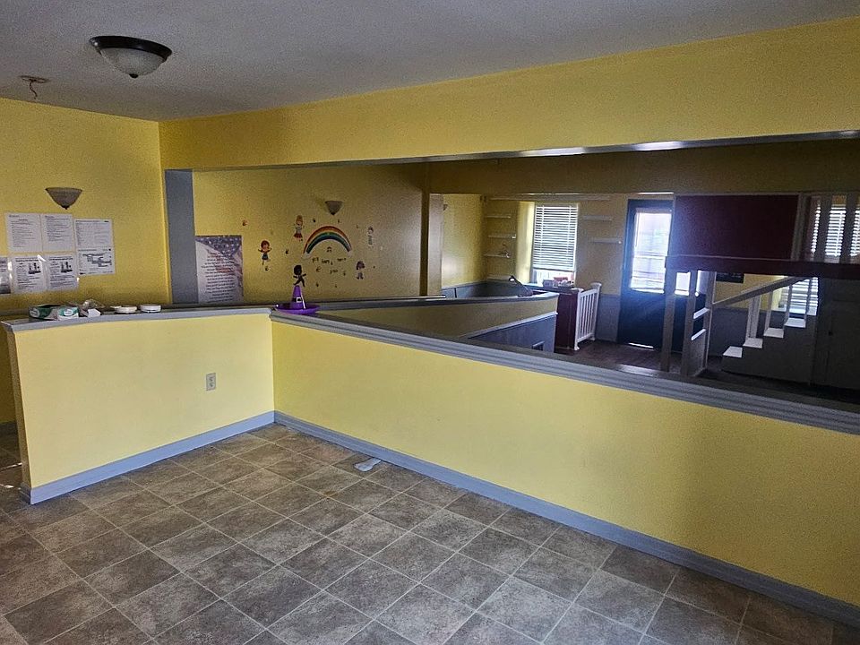 Large open space works well for retail, office, studio, or service business.