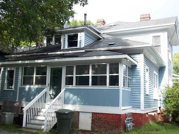 Rear of house with enclosed porch