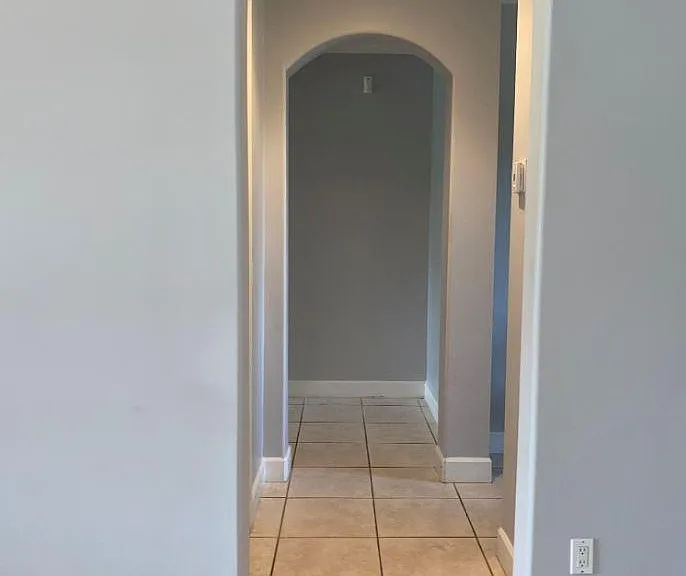 hallway to master room