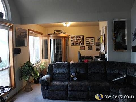 Living room view into formal dining room/ extended living room