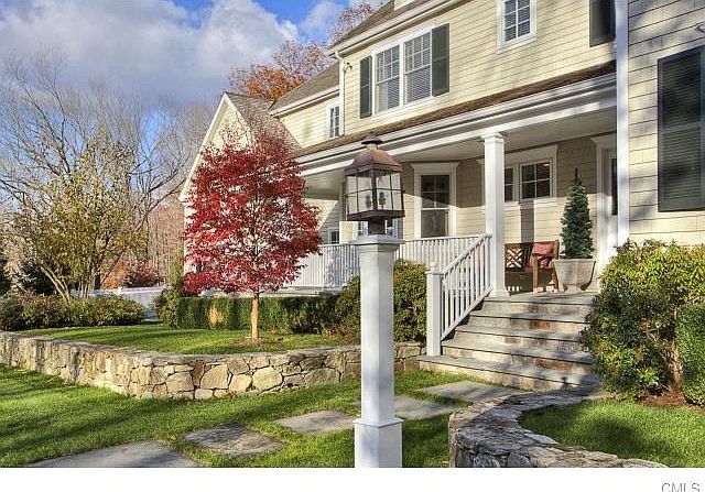 Beautiful, lush gardens surround the property.