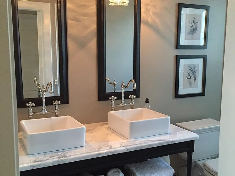 Remodeled hall bath with walk in shower.