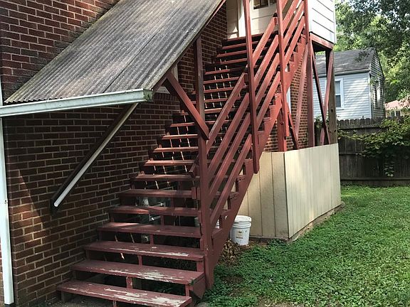 Private entry to second level apartment.