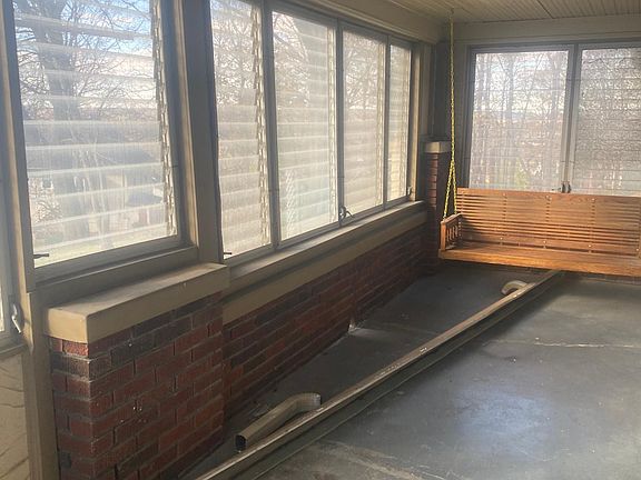 enclosed porch to enjoy a book or drink