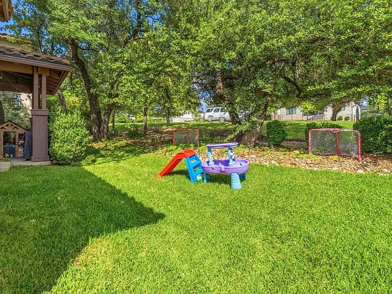 15317 Falconhead Grove Loop — Photo 24