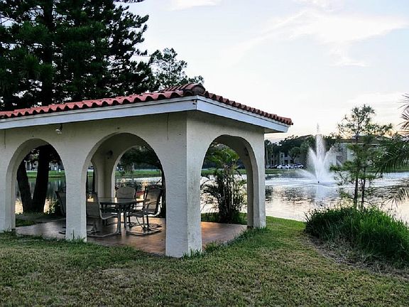 Backyard and gazebo with outside dining area