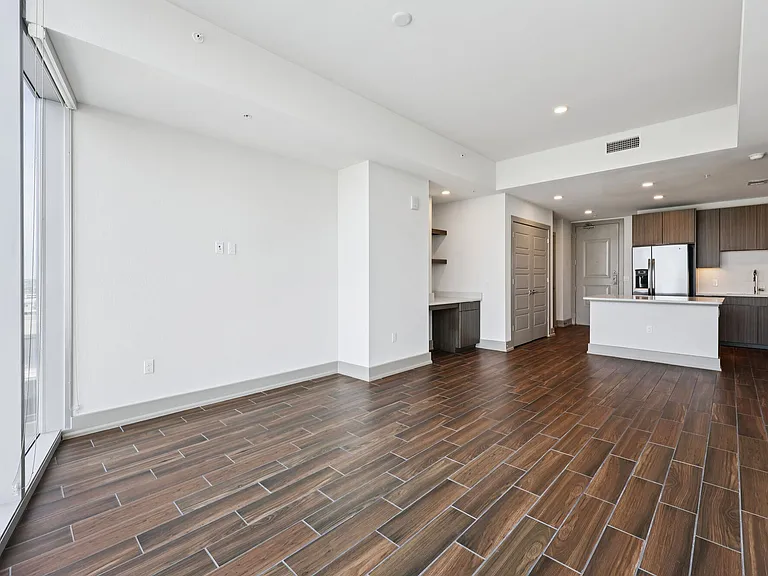 Apartments with Bult-in Desks and Hardwood Floors Throughout