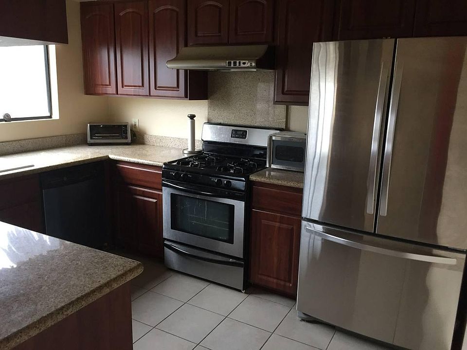 Kitchen with newer 25 cubic feet French door refrigerator