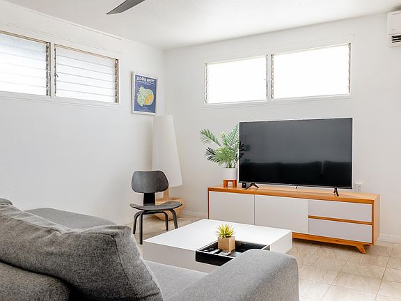 Gather around your cozy living room equipped with high powered air conditioning.