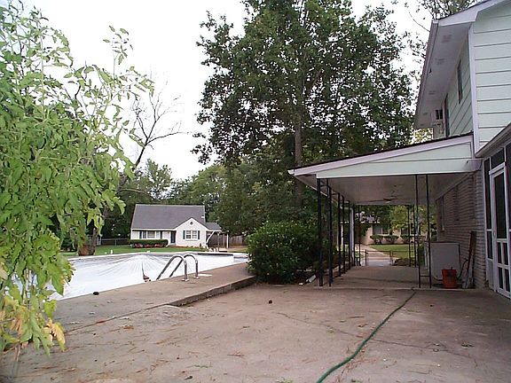 Back view shows inground pool