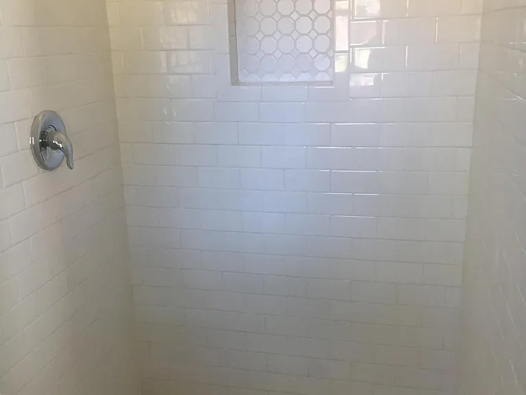 Primary bedroom tiled shower