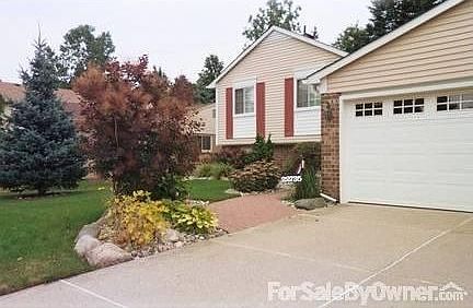 Professionally landscaped with sprinkled system.