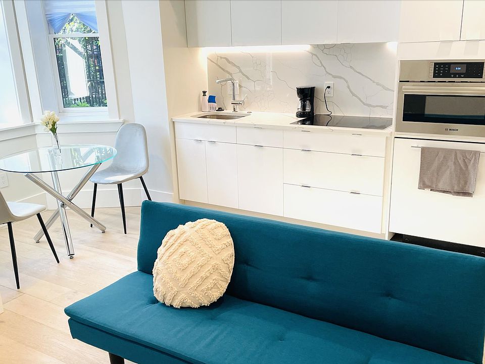Open kitchen with plenty storage.