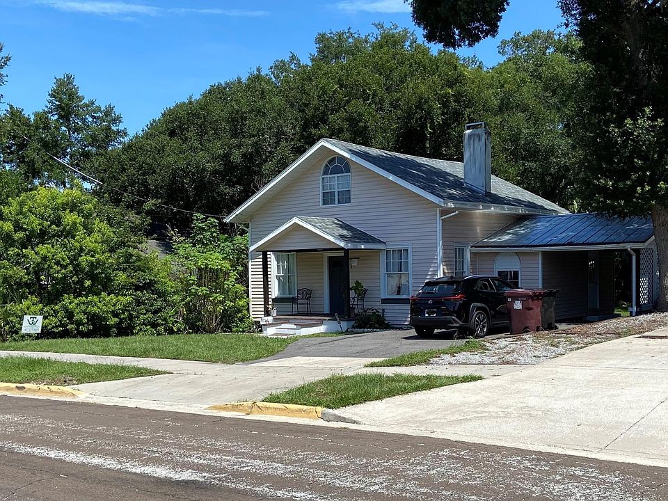 Updated charming home with large backyard, carport and ample parking