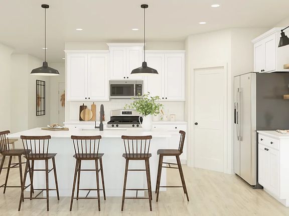 Kitchen with island and pendant lighting