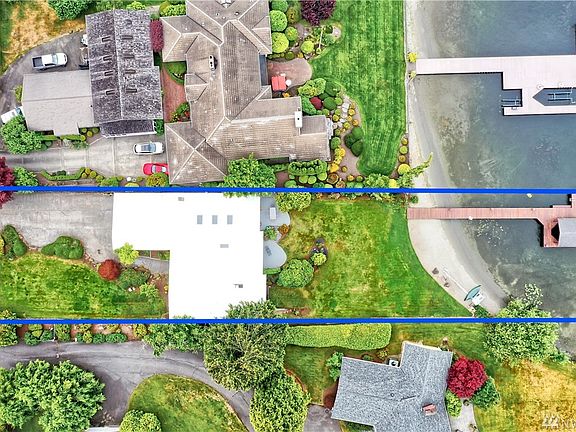 Plenty of guest parking (you'll need it!), and generous front and back yards. 