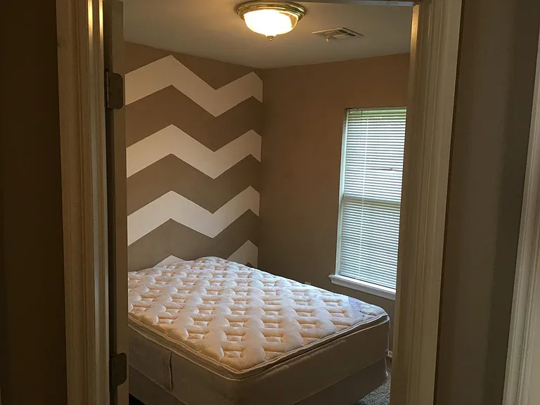 bedroom 4 back left