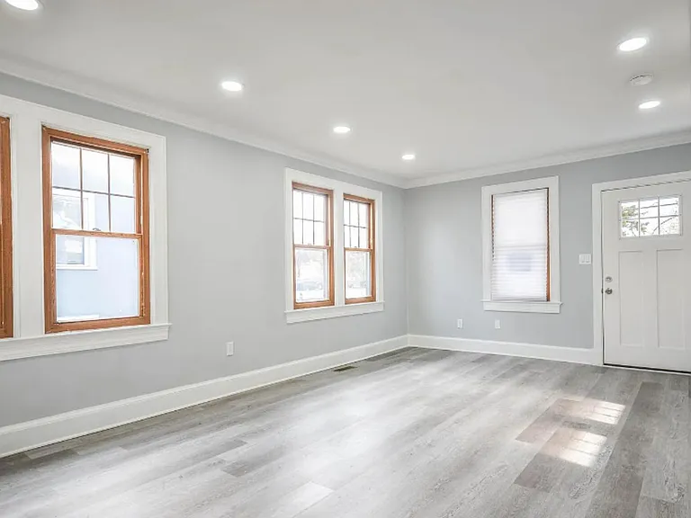 Newly renovated with fresh paint, modern lighting, and sleek flooring for a bright, welcoming feel.