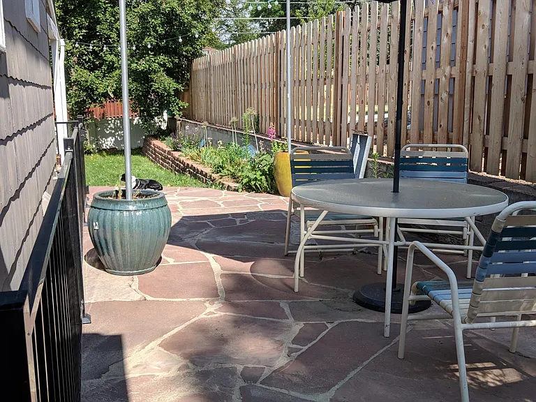 Flagstone Patio with table set and cable night lights
