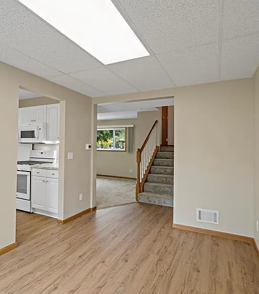 Dining room with sliding door access to the huge fully fenced-in back yard complete with concrete patio and privacy fence