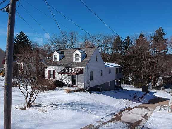Note rear addition and porch