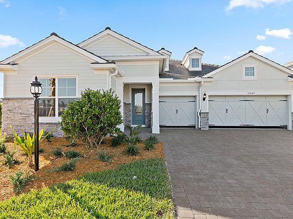 Creekview exterior with full 3-car garage