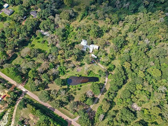 Welcome home to this beautiful 10 acre Unrestricted property with 3 stall barn, storage shed, lake, and so much more!