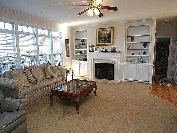 Natural light from the additional transom windows opens up the family room.