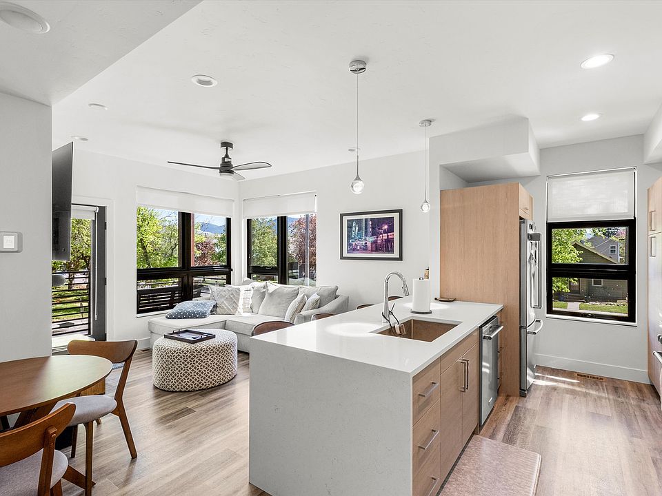 Kitchen and Living Room with dining nook and gorgeous Eastern views of Mt Sentinel.