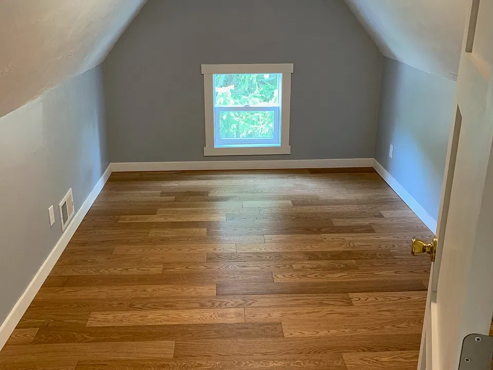 Upstairs bonus room. Big enough for office or bed.