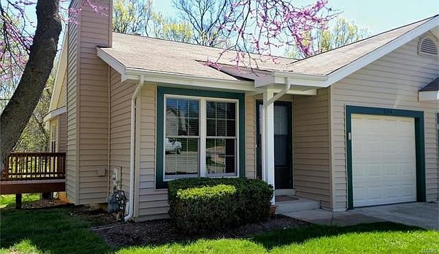 Cozy cottage home with great curb appeal.