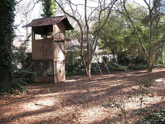 Playhouse and swing set