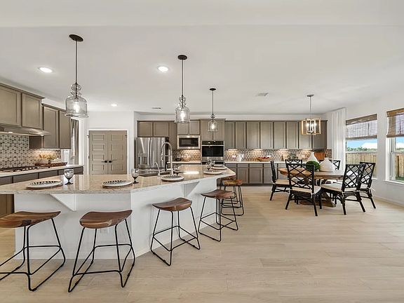 Kitchen with island and pendant lighting