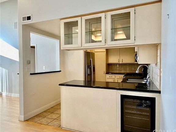 4th image of 15214 S Raymond Ave APT 104