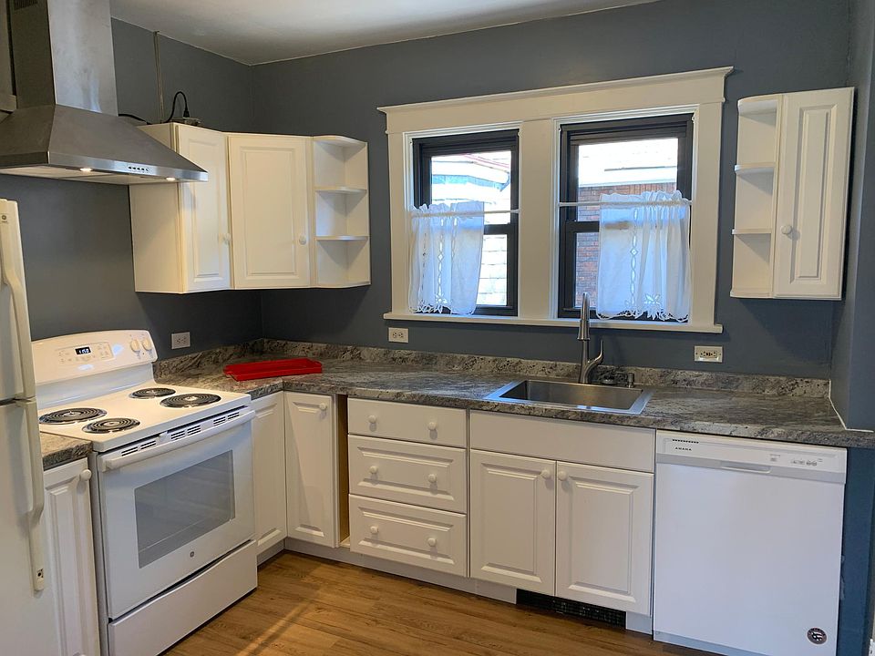 Newly updated and spacious kitchen. New stove and dishwasher. Has pantry.