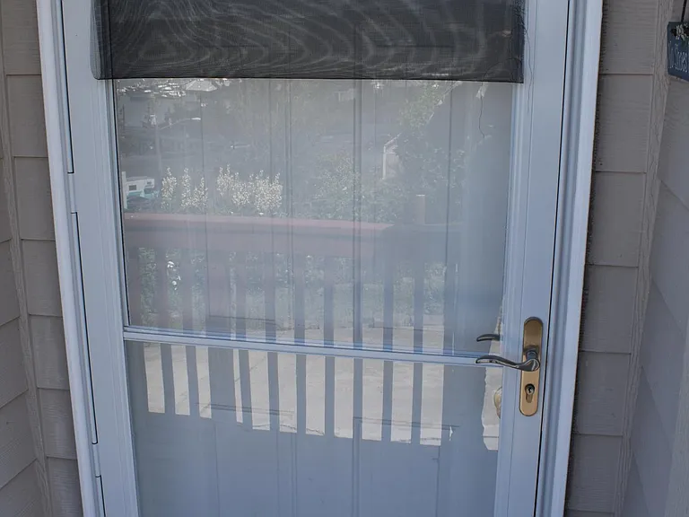 Front storm door