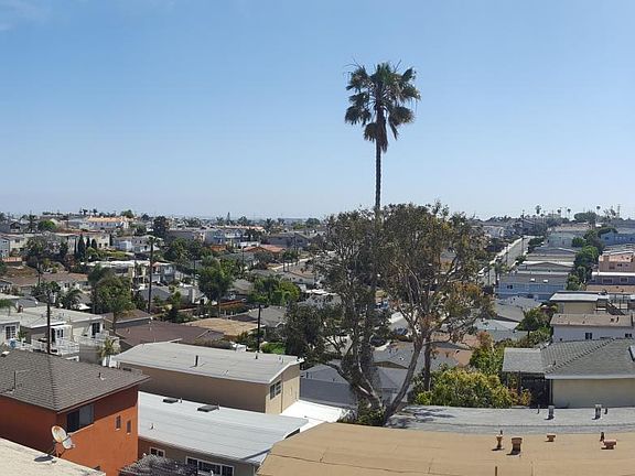 View overlooking LA with San Gabriel mountain snow, and Hollywood sign